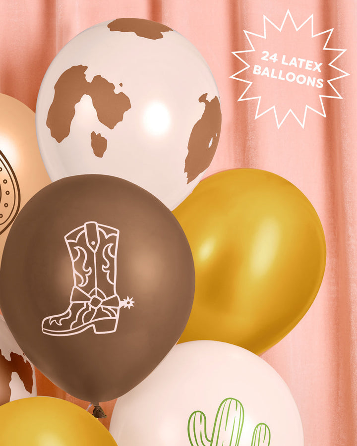 Bunch of western cowboy latex balloons against a tan backdrop