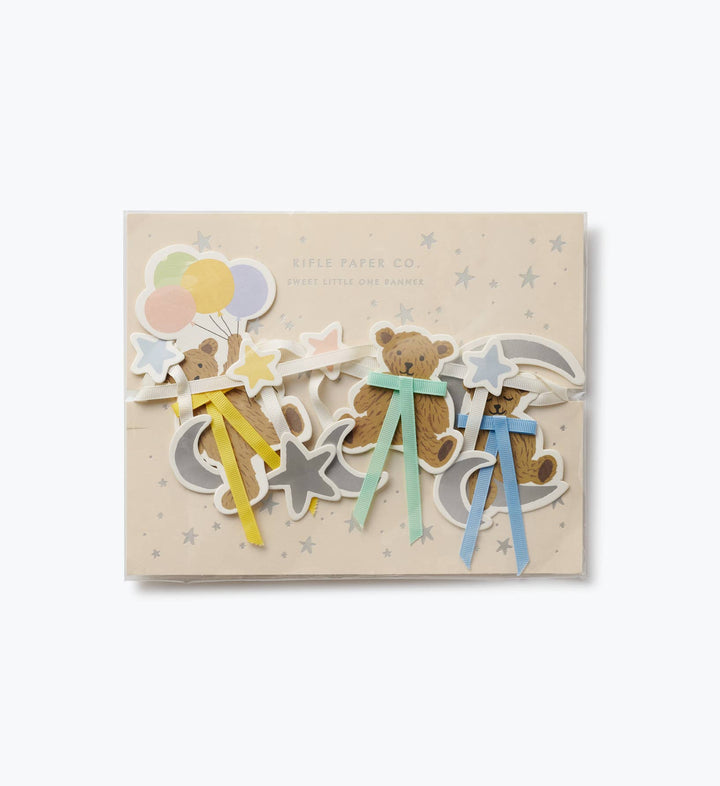 Sweet Little One garland in Rifle Paper Co packaging showing teddy bears with yellow, mint, and blue bows