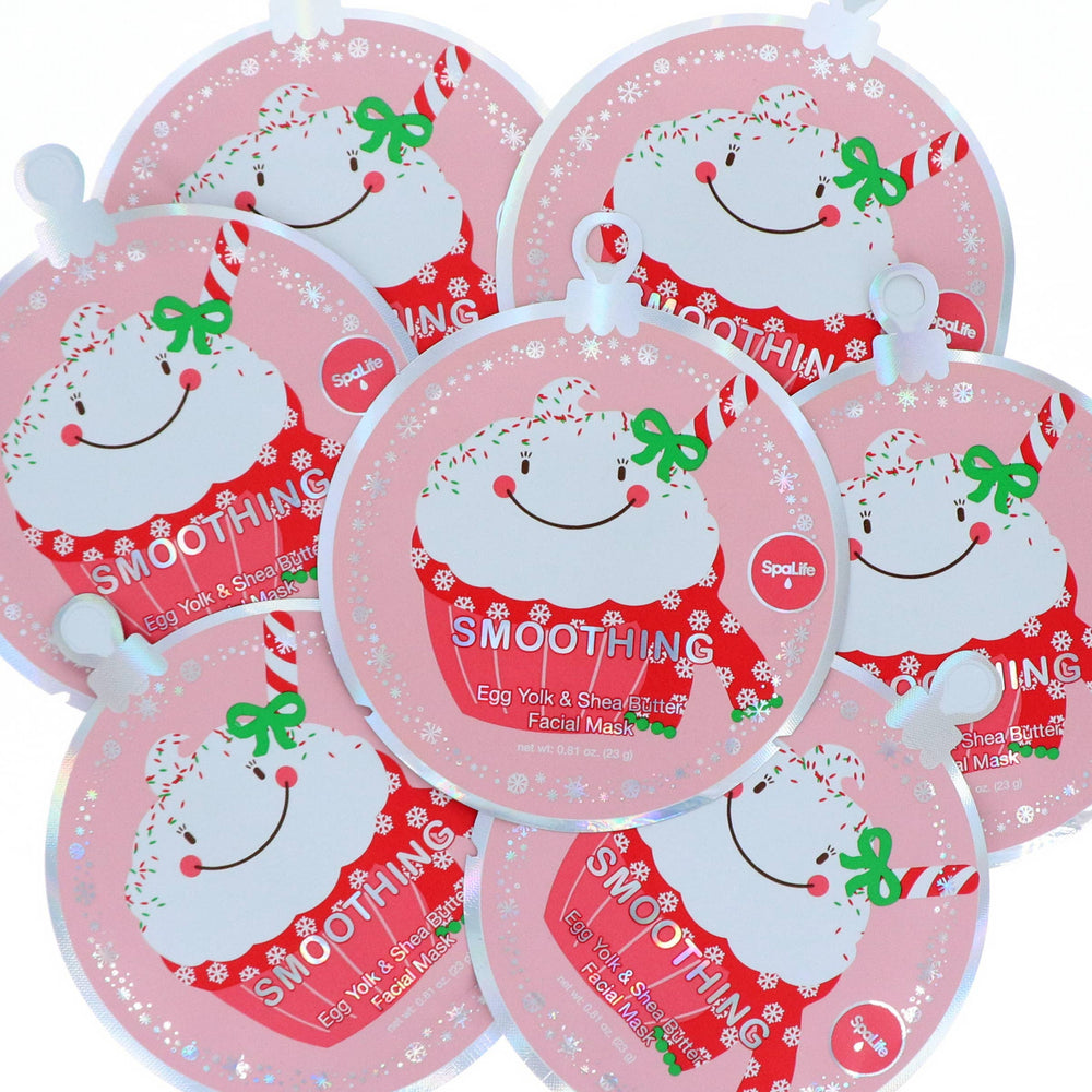 Cluster of holiday cupcake sheet mask pouches overlapping, easy gifts for a Christmas spa night with friends