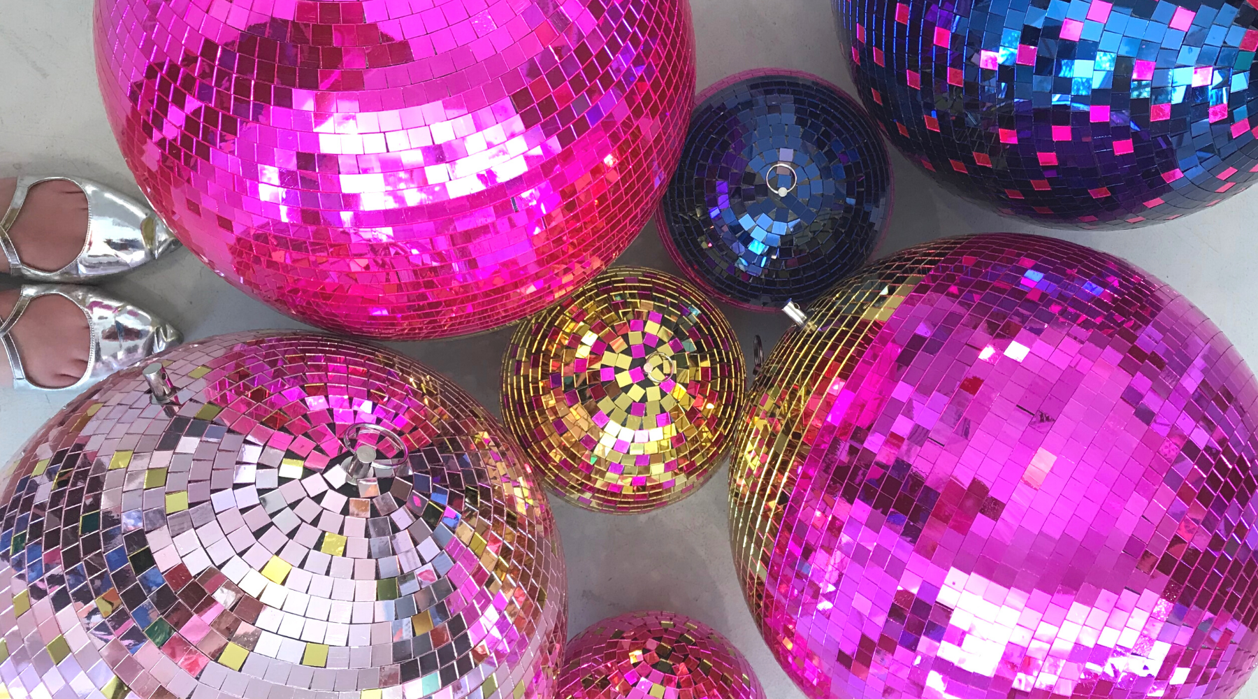 Disco balls used as disco party decorations.  