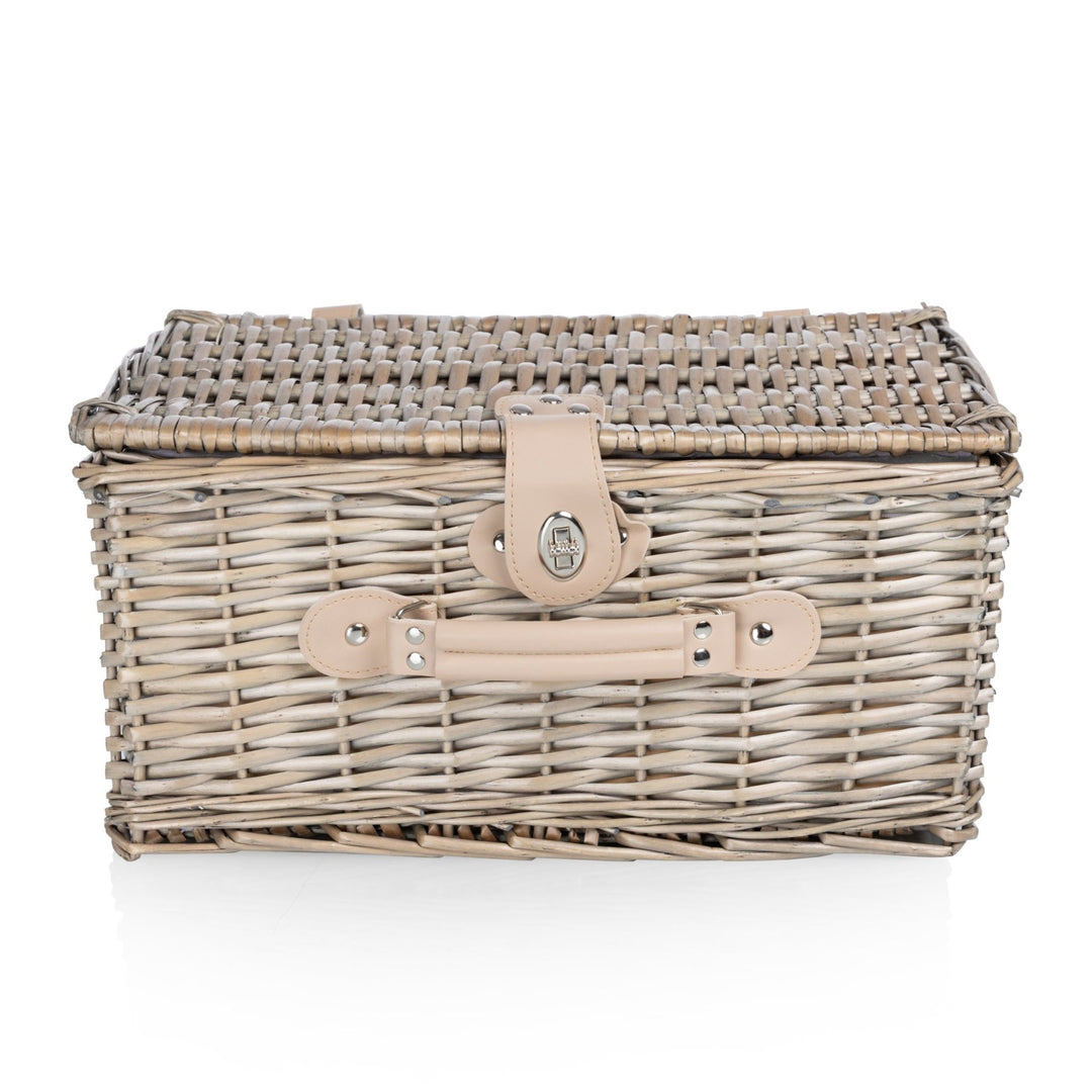 Classic picnic basket for two, carried to a park lunch or a beach evening