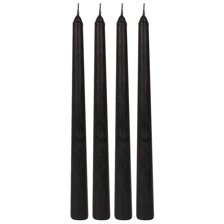 Four unlit black taper candles that bleed pink when lit, gothic glam for a Halloween party