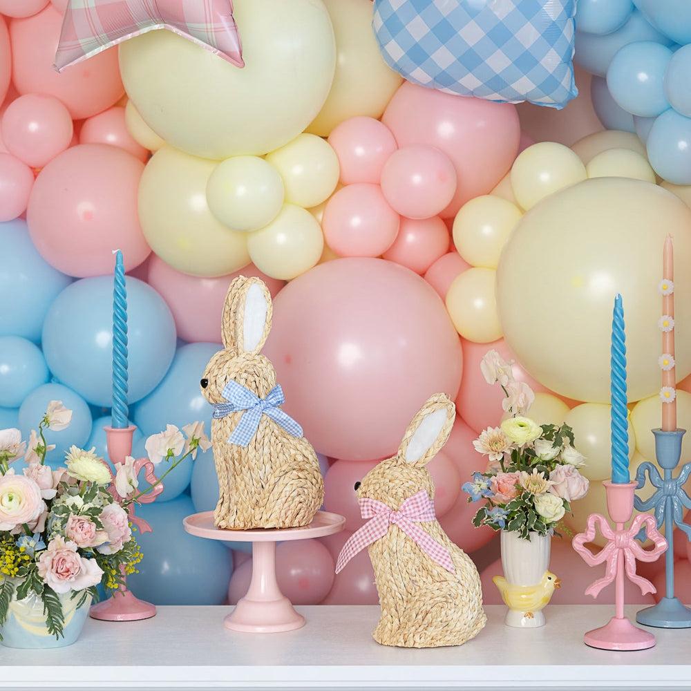 PINK BOW CANDLESTICK HOLDER with blue taper candles Raz Valentine's Day Decor PINK BOW CANDLESTICK HOLDER Bonjour Fete - Party Supplies