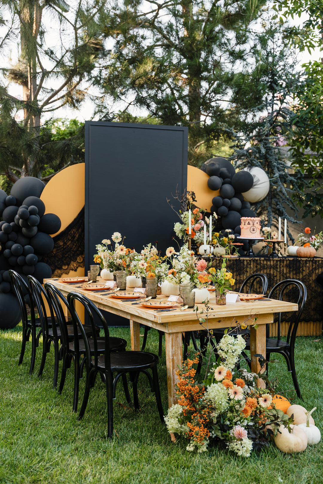vintage halloween party table with lace floral decorations