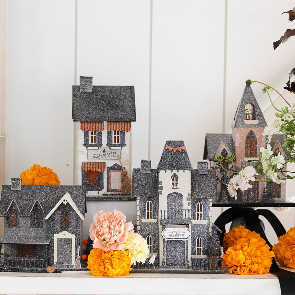 Haberdashery haunted village house styled in a Halloween village display