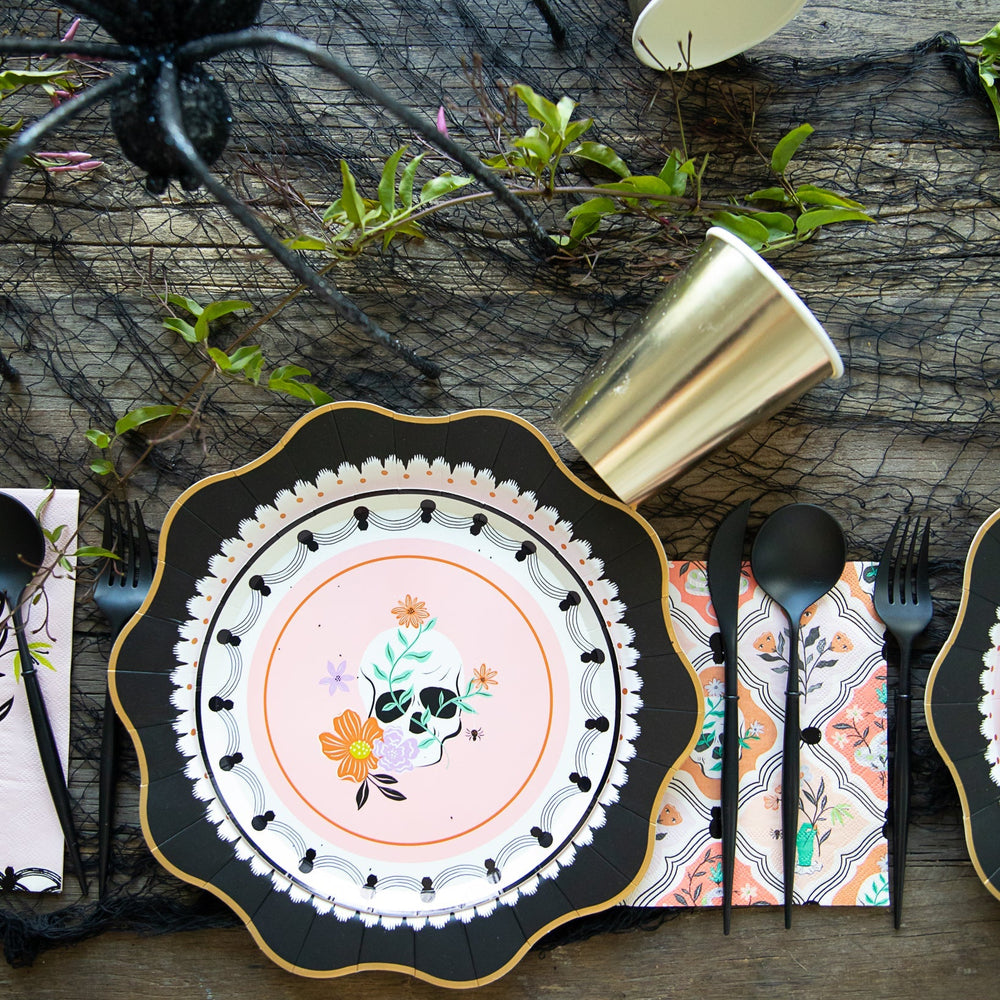 Floral skull and spider print dessert plates for a Halloween party