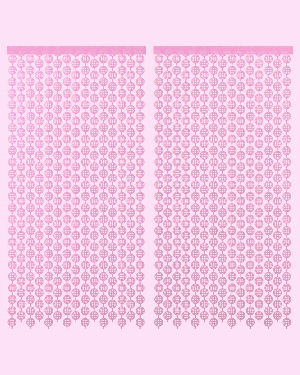 Two pink disco ball foil curtain panels hung side by side on a pale pink wall