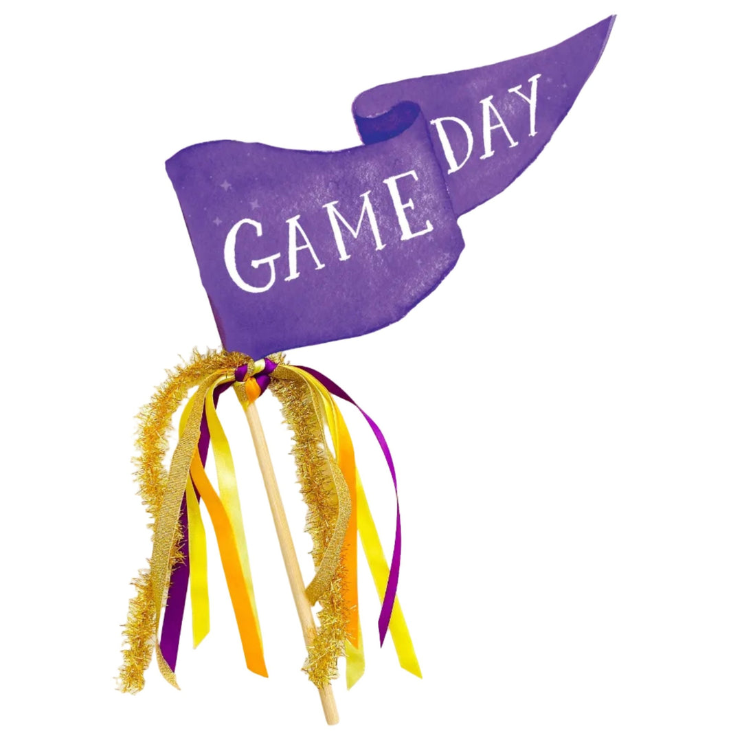 Purple Game Day pennant flag with purple, gold, and yellow ribbons and gold tinsel on a wood dowel