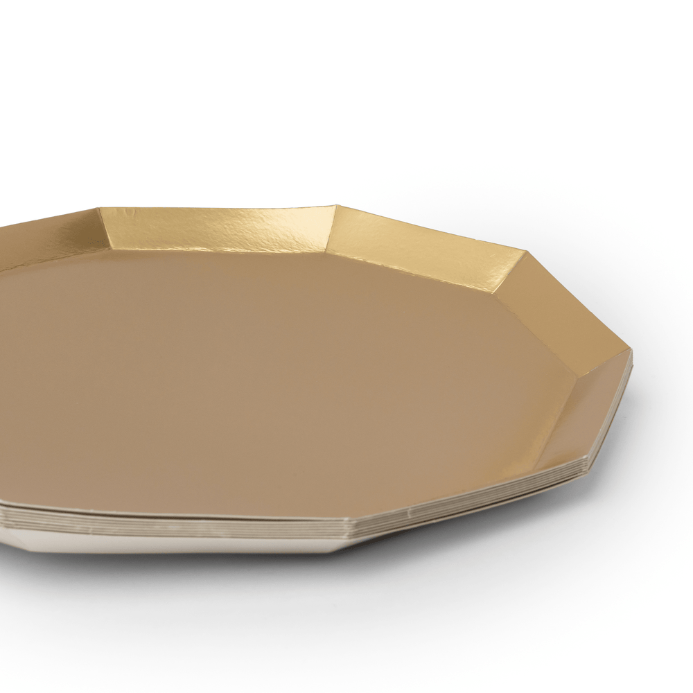 Stack of gold foil decagon party dinner plates showing the angled rim