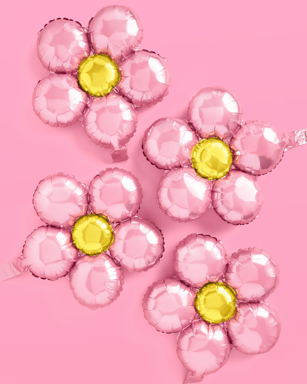 Flower foil balloons styled together