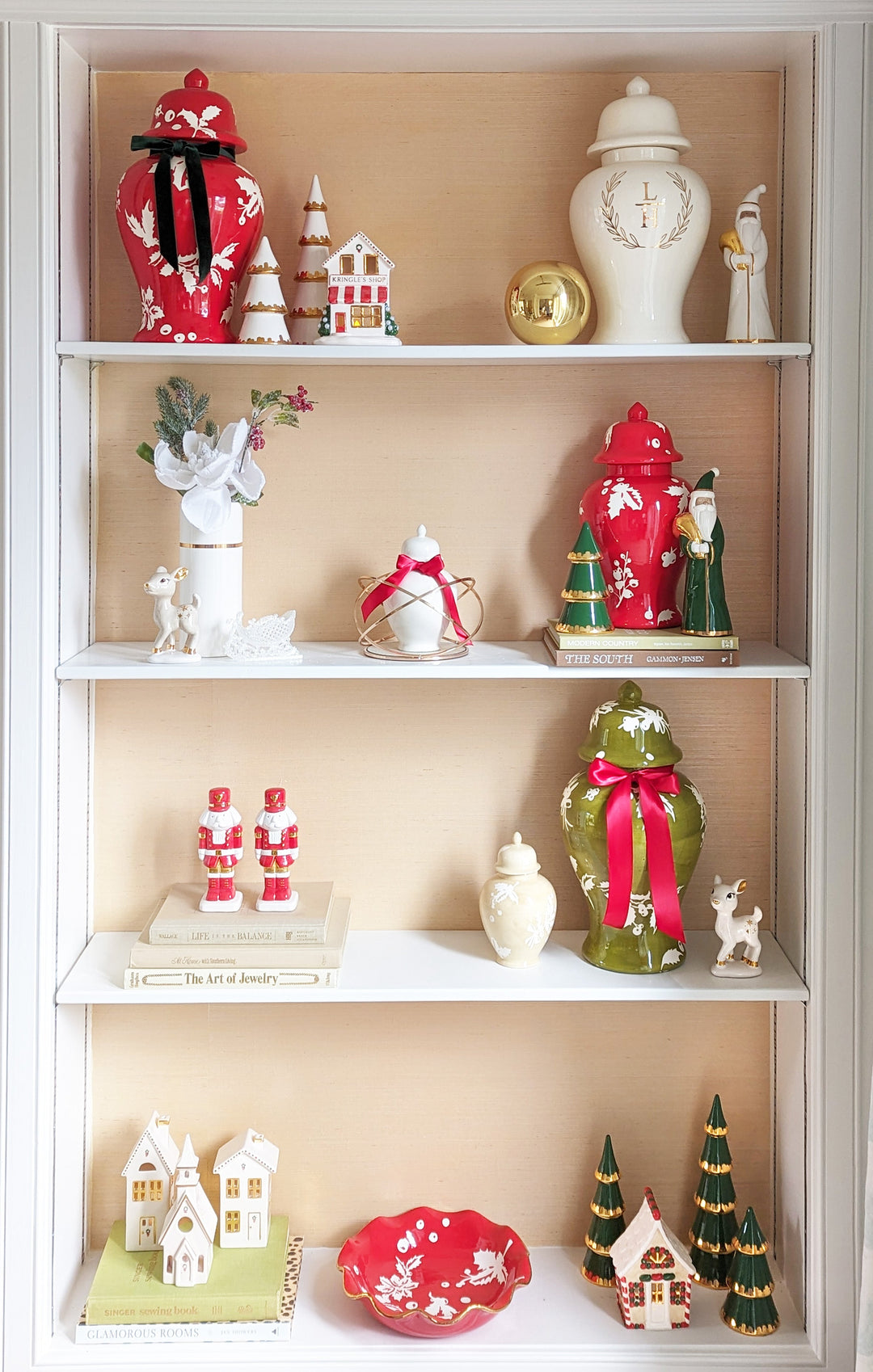 Decorative shelves with various small figurines and ornaments on a beige wall.