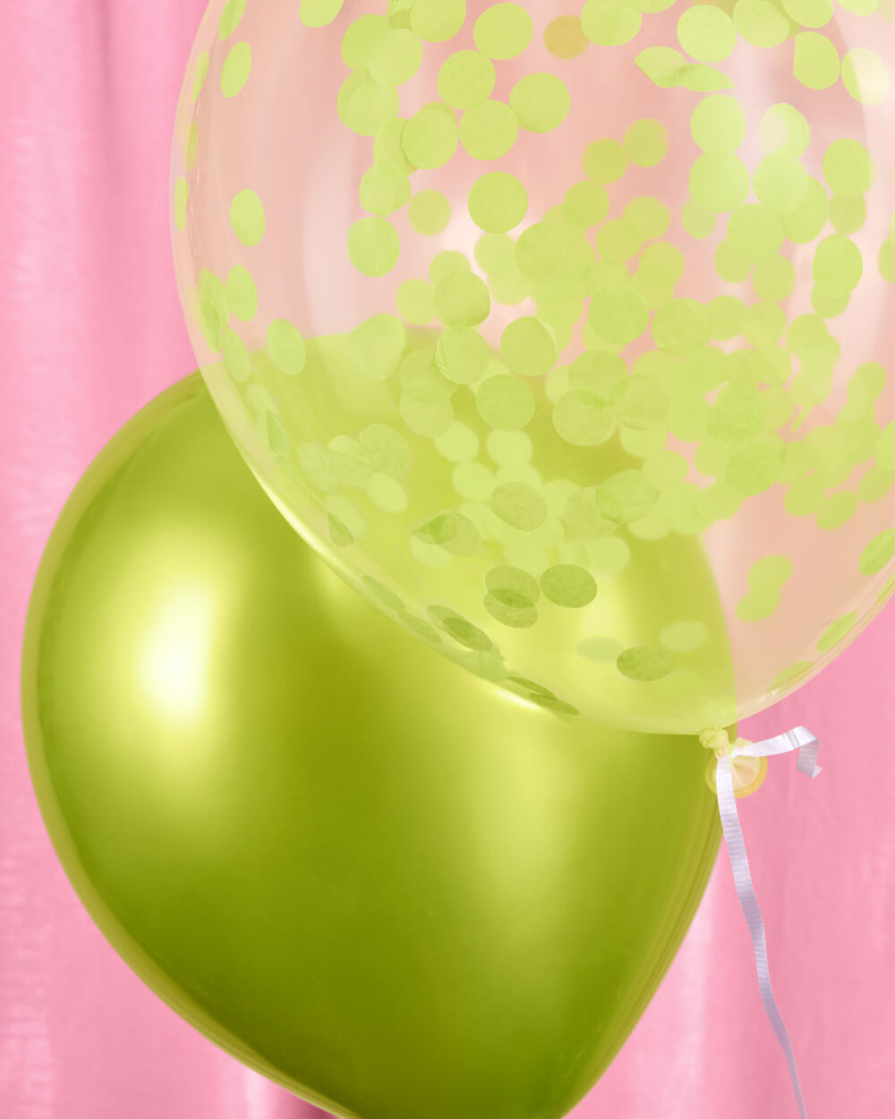 Detail of metallic lime green latex balloons