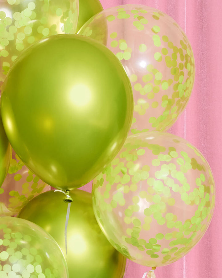 Styled lime green confetti latex balloons for a bold birthday or bachelorette