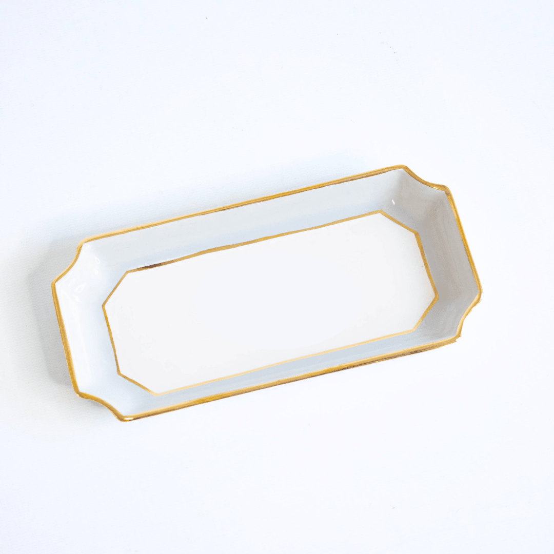 Light gray petite valet tray with gold trim on a white studio backdrop, product view for a host gift