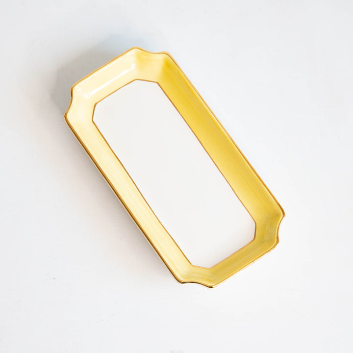 Butter yellow petite valet tray with gold trim on a white backdrop, a sunny spring birthday gift
