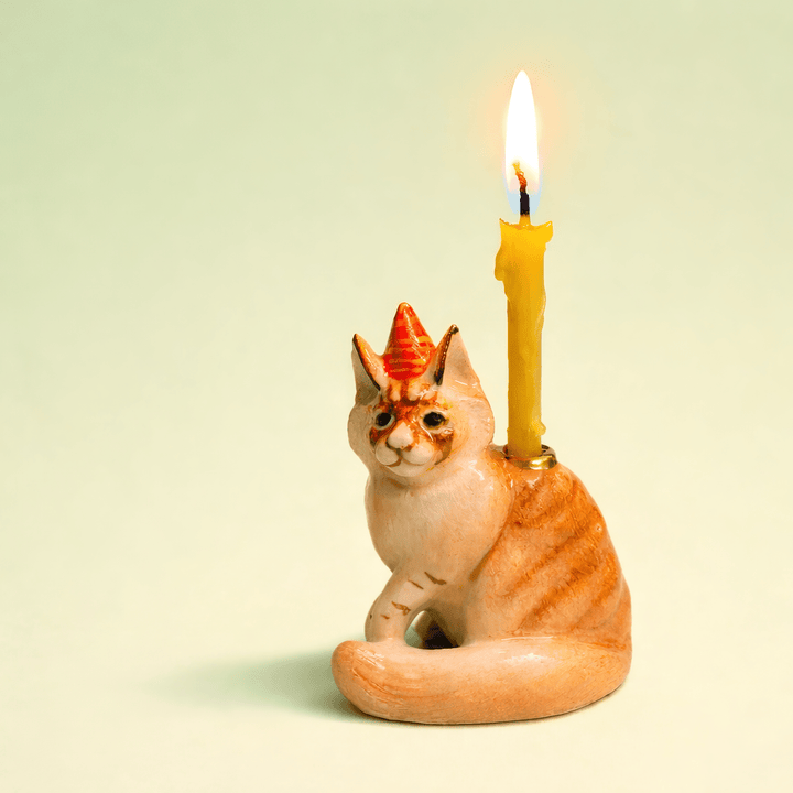 Maine coon cat porcelain cake topper candle holder in a party hat, a birthday cake topper for cat lovers