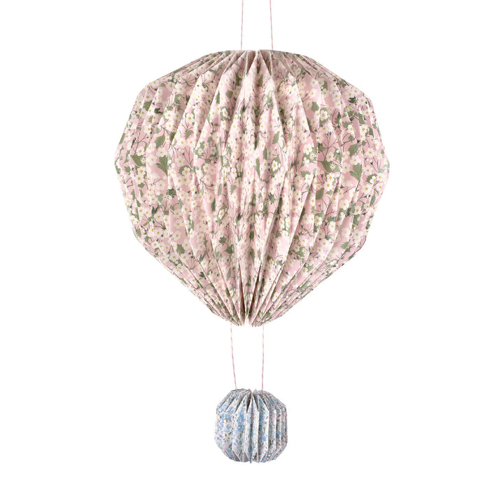 Meri Meri X Liberty origami balloons styled as hanging party decorations for a floral birthday or garden party