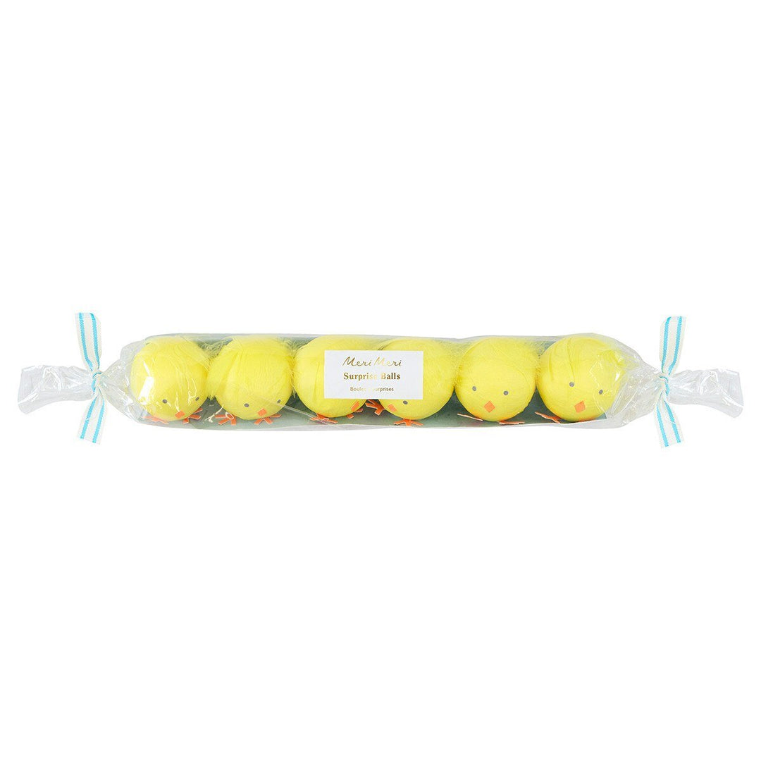 Six yellow chick surprise balls in clear candy-style packaging tied at both ends with blue ribbon.