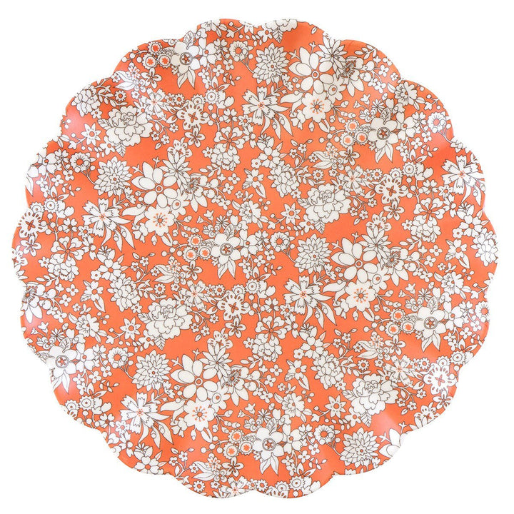 Orange scalloped reusable melamine plate covered in delicate cream Liberty floral outlines.