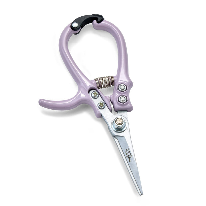 Lavender needle-nose garden shears with closed straight blades and a coil spring on white