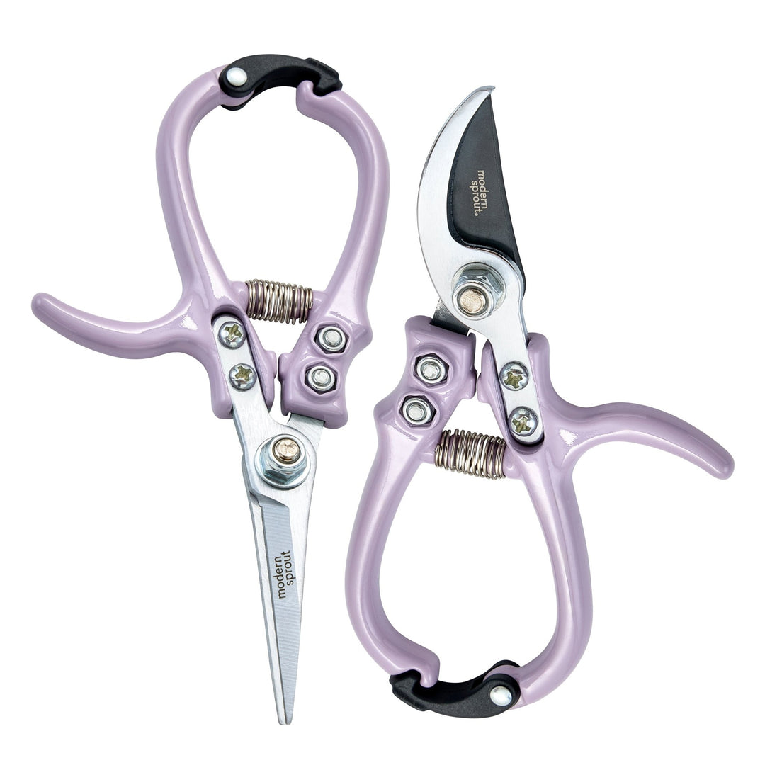 Lavender needle-nose shears and bypass pruners arranged in opposite directions on white