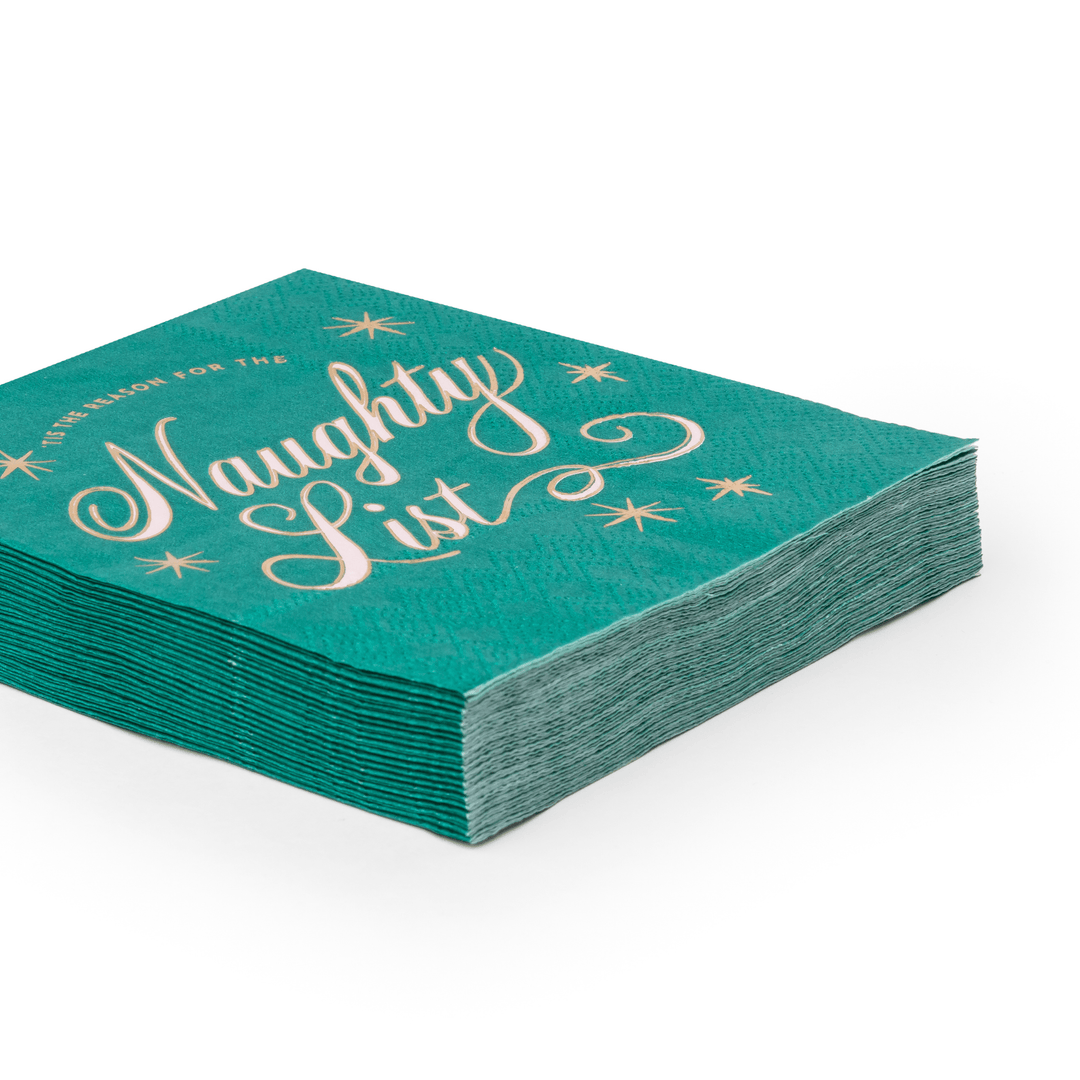 Stack of green Naughty List napkins showing the folded holiday design