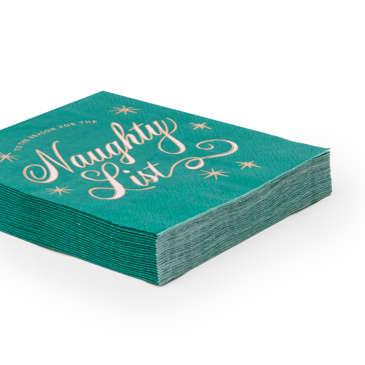 Stack of green Naughty List napkins showing the folded holiday design