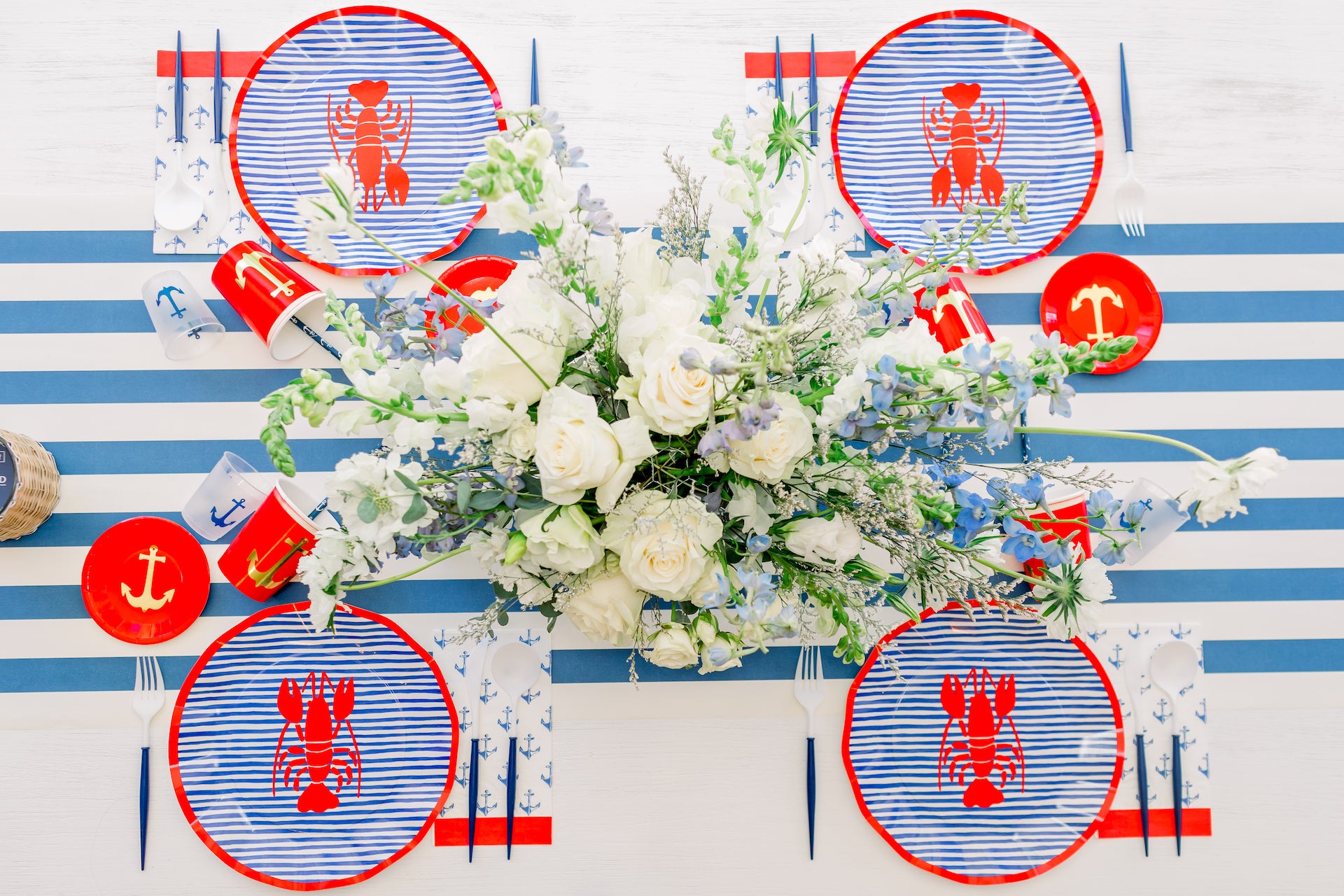 Nautical lobster theme party supplies set out for a nautical party. 
