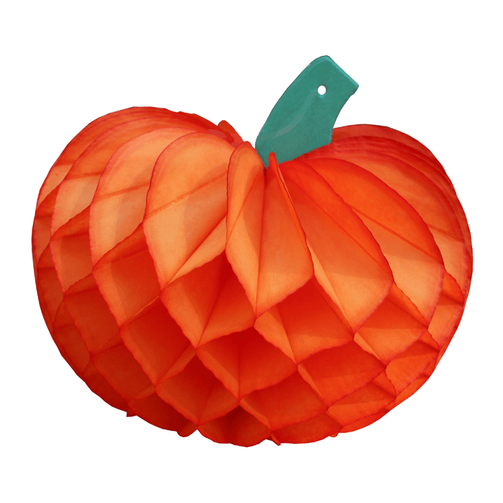 Orange honeycomb tissue paper pumpkin with a green stem for Halloween and fall table decor
