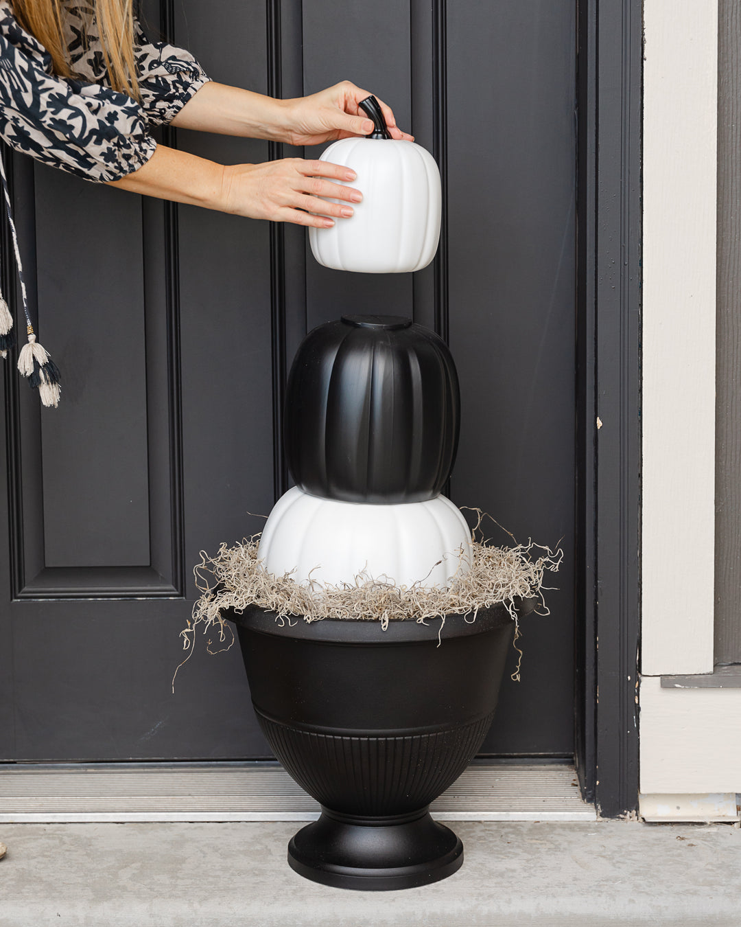 Black and white pumpkins as outdoor Halloween decorations