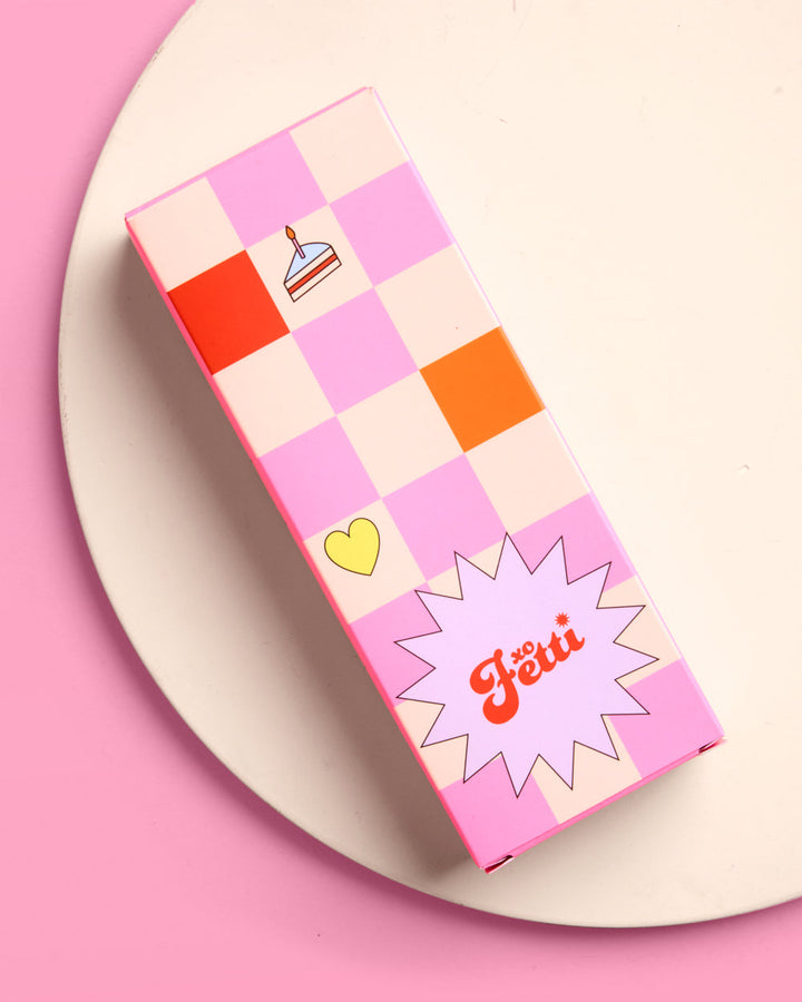 Birthday Girl sunglasses gift box with a pink and orange checkered pattern