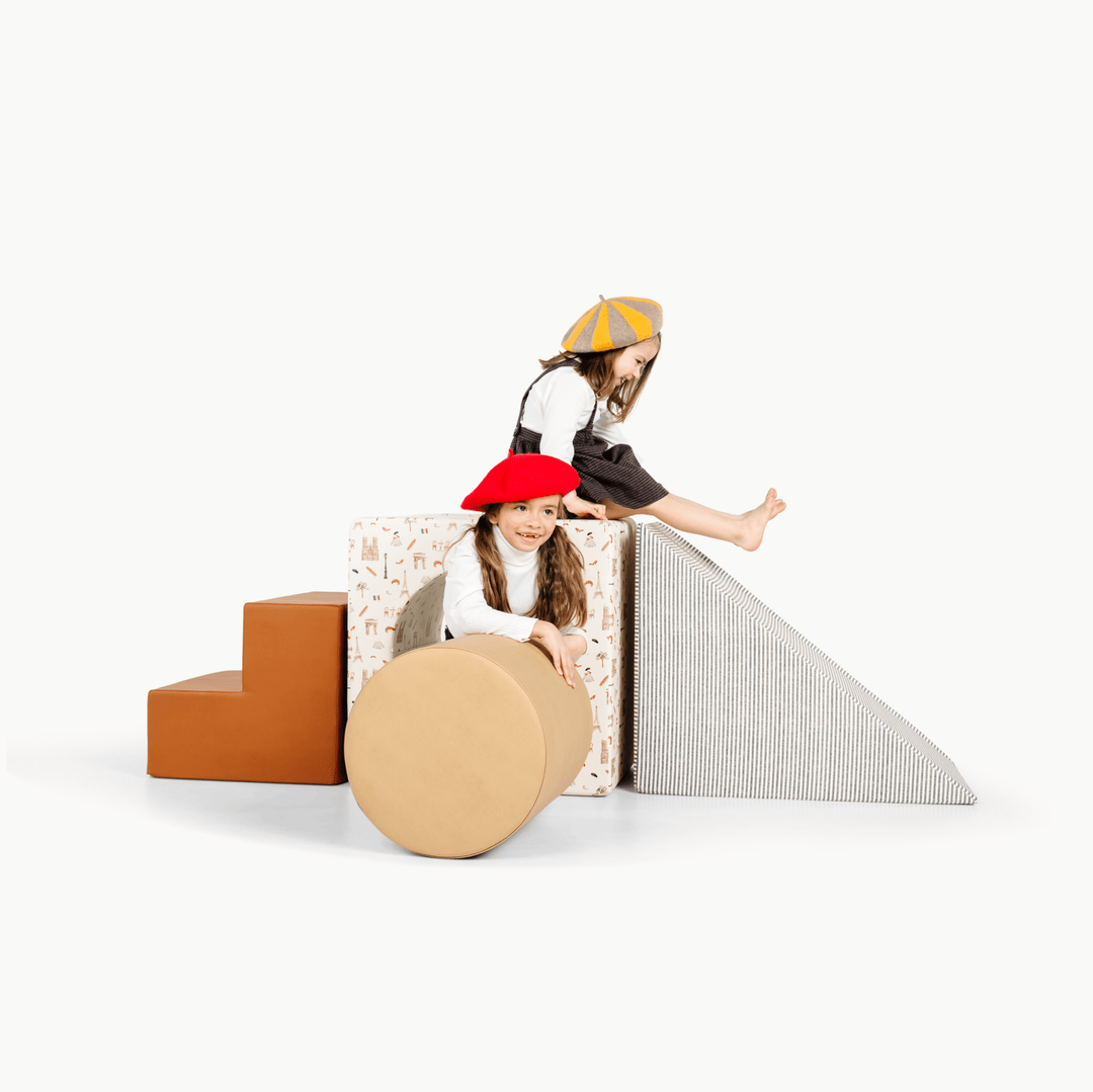 Gathre block playset with foam steps, a cube, and a triangle ramp in cream London print and rust