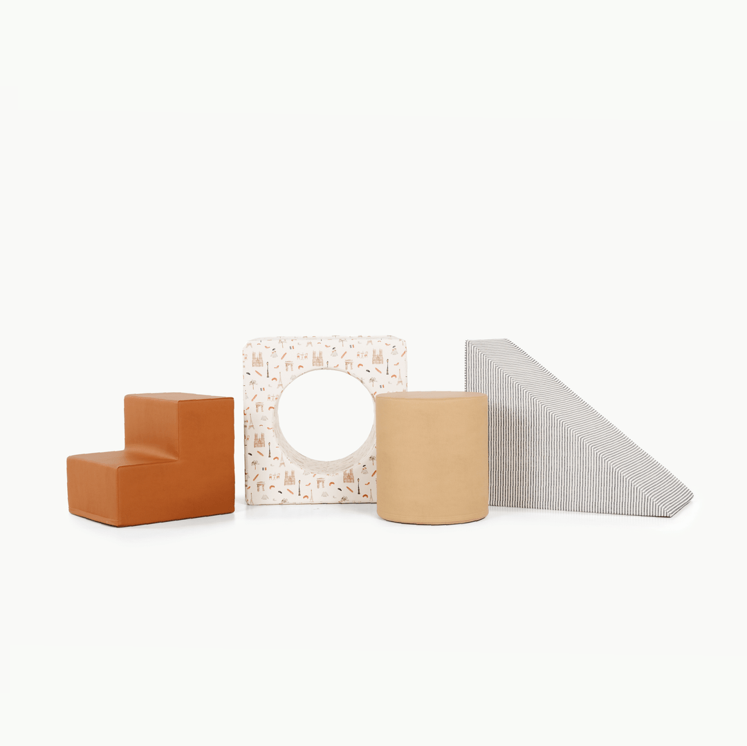 Gathre block playset with foam steps, a cube, and a triangle ramp in cream London print and rust