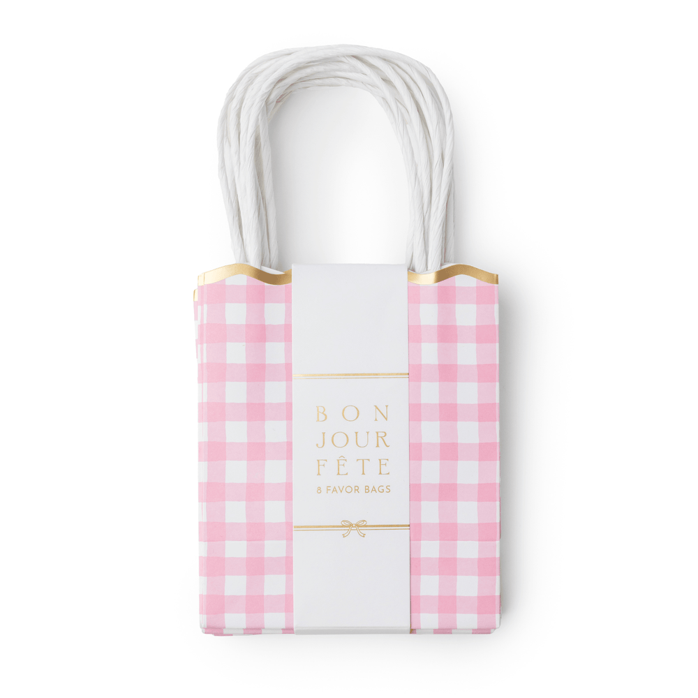 Petal pink gingham paper favor bags with scalloped trim for a birthday party or baby shower