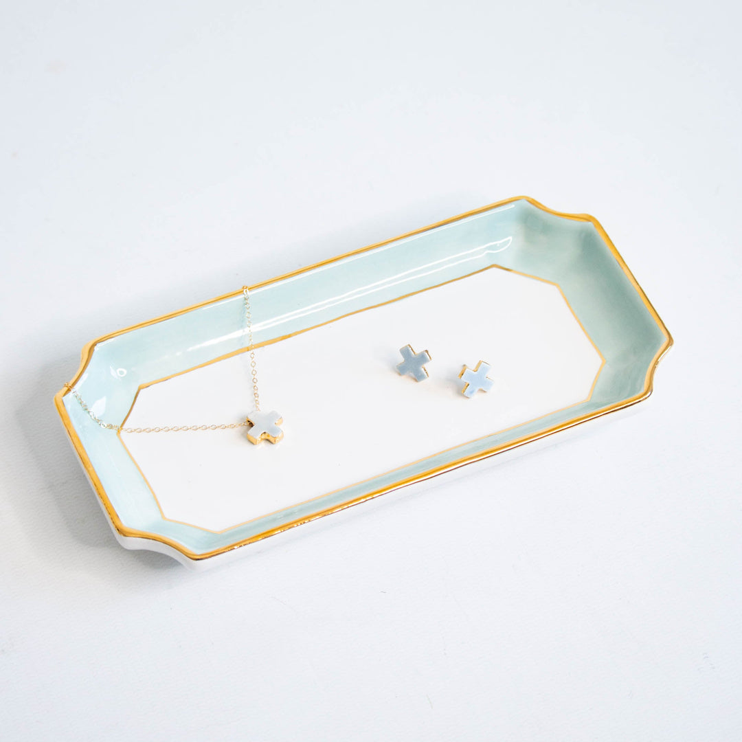 Aquamarine petite valet tray holding a delicate necklace and star earrings, styled for a bridal shower gift