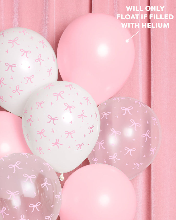 Pink bow latex balloon set in white, pink, and clear with bow prints