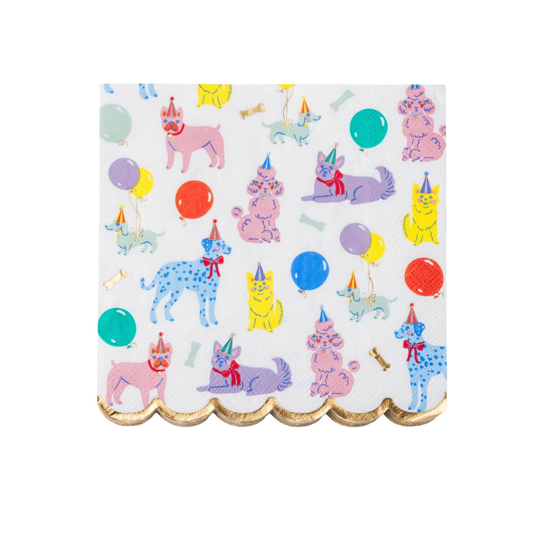 Puppy dog print large paper napkins in playful multicolor for a dog birthday party