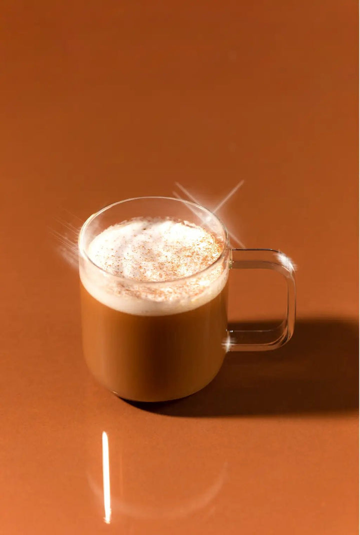Classic cafe latte made at home with a coffee mixer cube