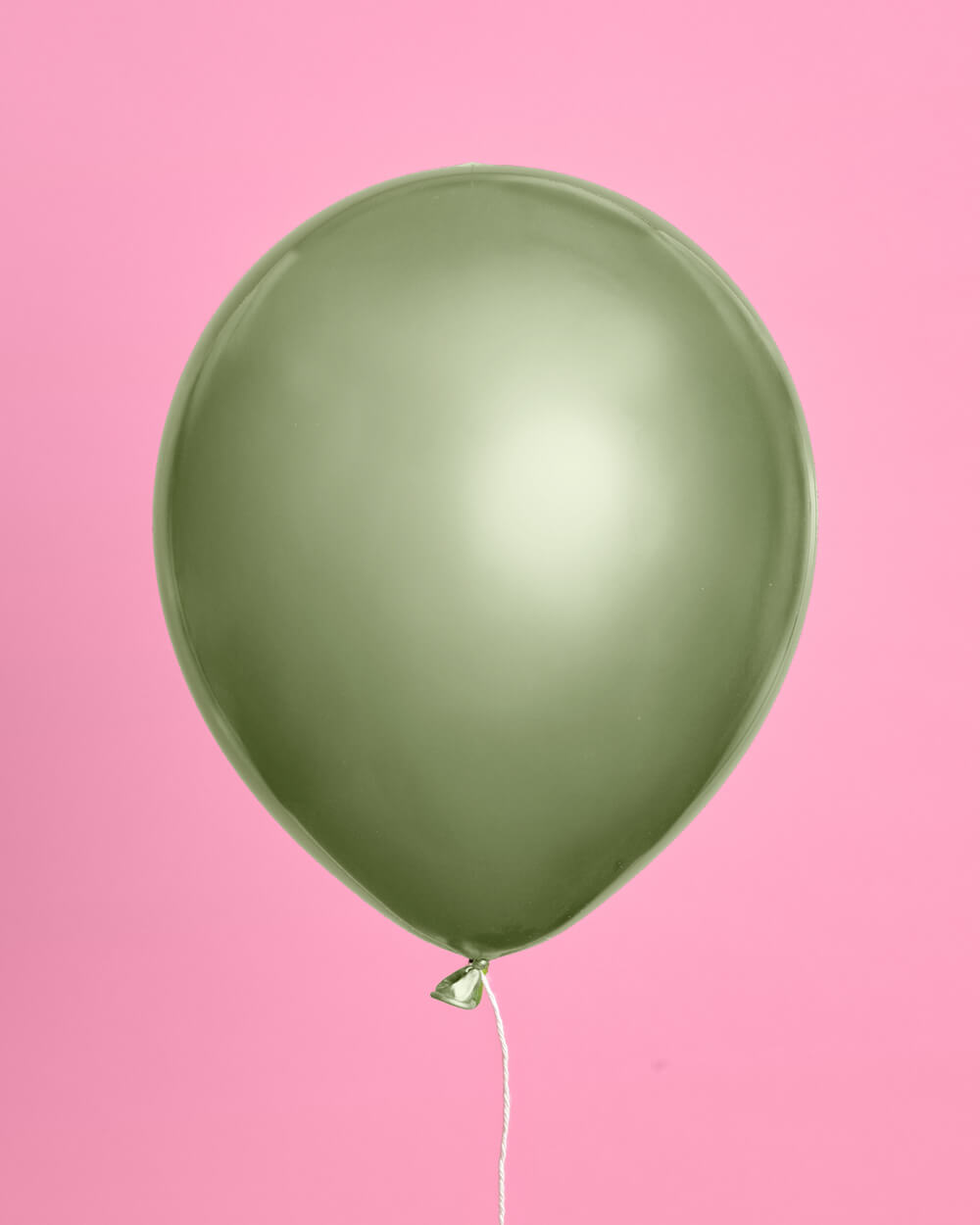 Bunch of sage green and silver chrome latex balloons for a modern celebration