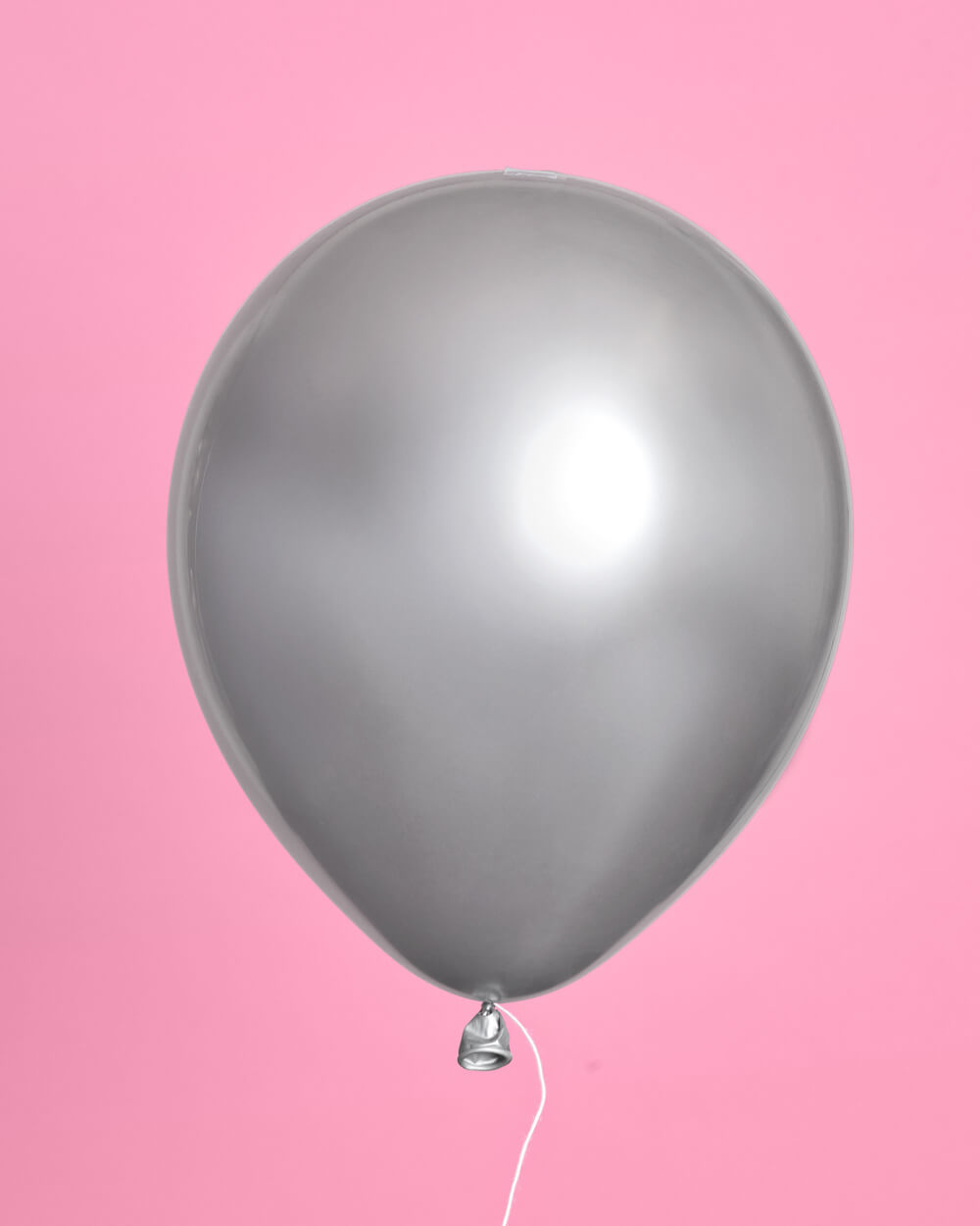 Styled sage green, chrome, and white latex balloons for a bachelorette or bridal shower
