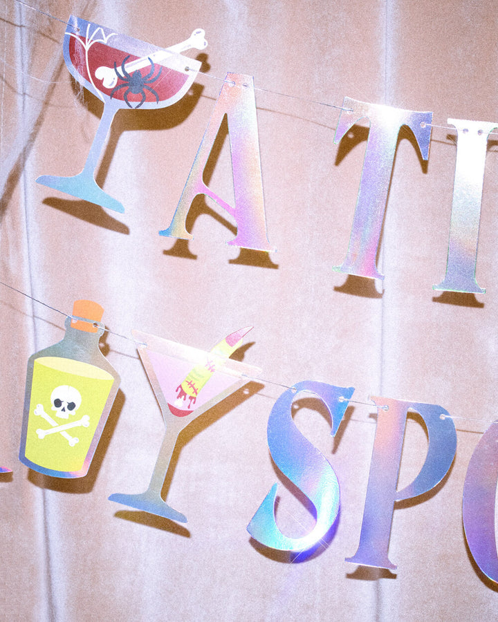 Tini Bit Spooky Banner - 6 ft iridescent banner