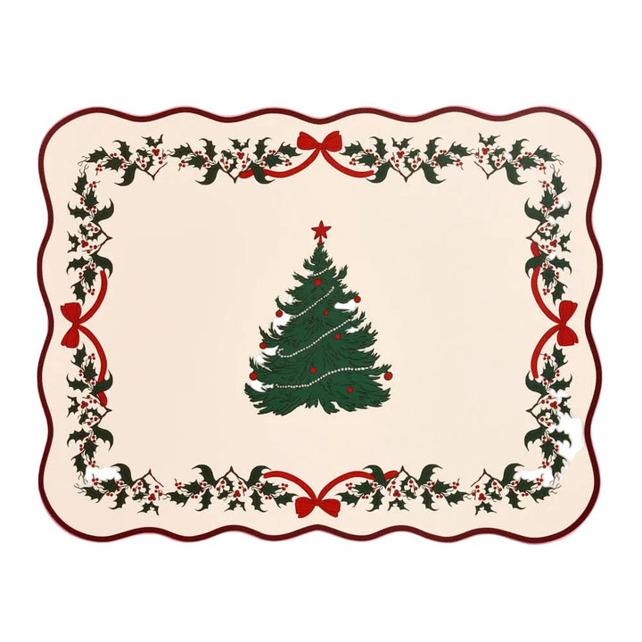 Cream paper placemat with a scalloped edge, green Christmas tree, and holly border
