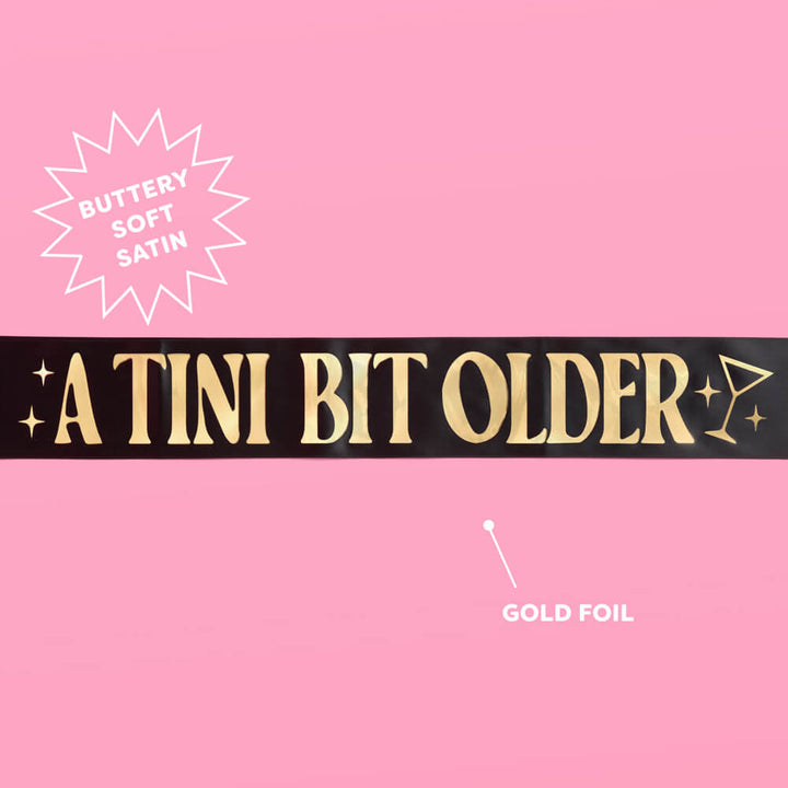 Tini Bit Older Sash - black satin sash xo, Fetti sash Tini Bit Older Sash - black satin sash Bonjour Fete - Party Supplies