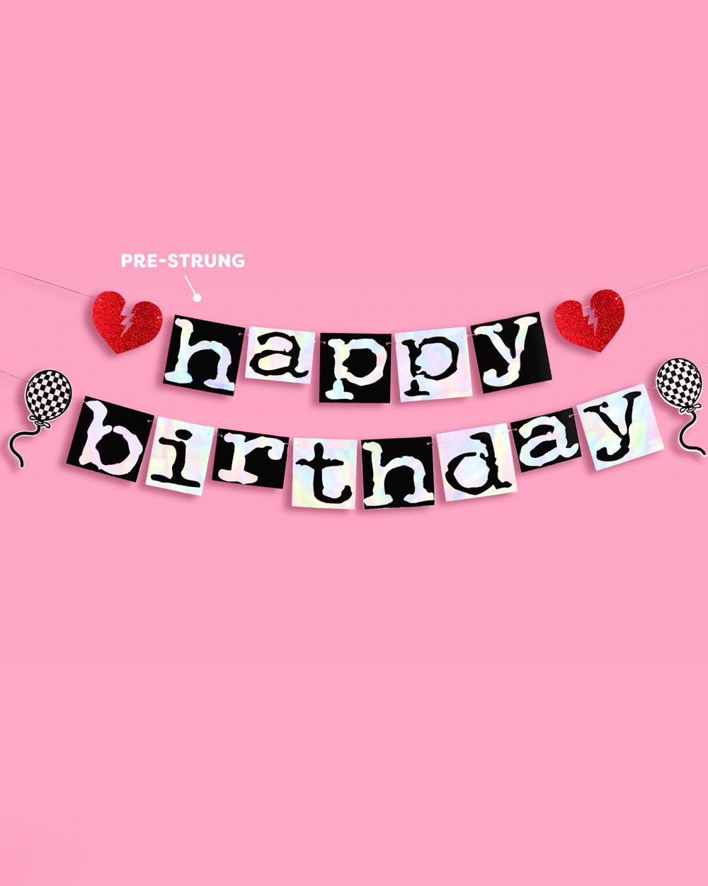Pre-strung emo Happy Birthday banner with red glitter broken hearts and checkered balloon icons on a pink wall
