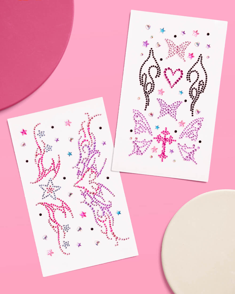 Two sheets of pink, purple, and black Y2K body gems included in the birthday bundle