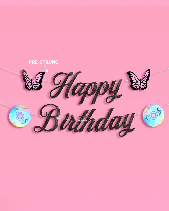 Black glitter Happy Birthday banner with butterflies and CDs from the Y2K birthday party bundle