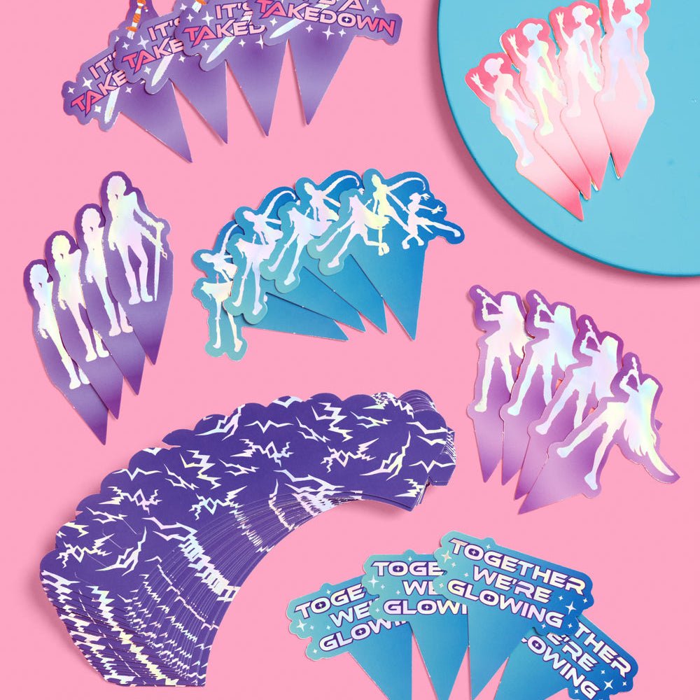 Takedown cupcake toppers and wrappers by xo Fetti in purple lightning print with Together We're Glowing toppers