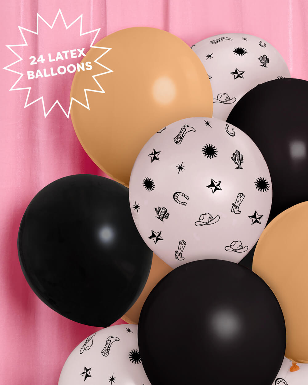 Cowgirl balloon garland styled at a party