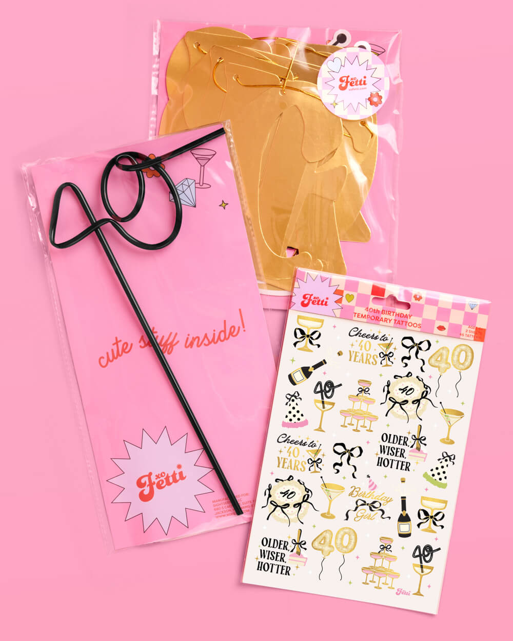 40th birthday bundle contents on a pink background