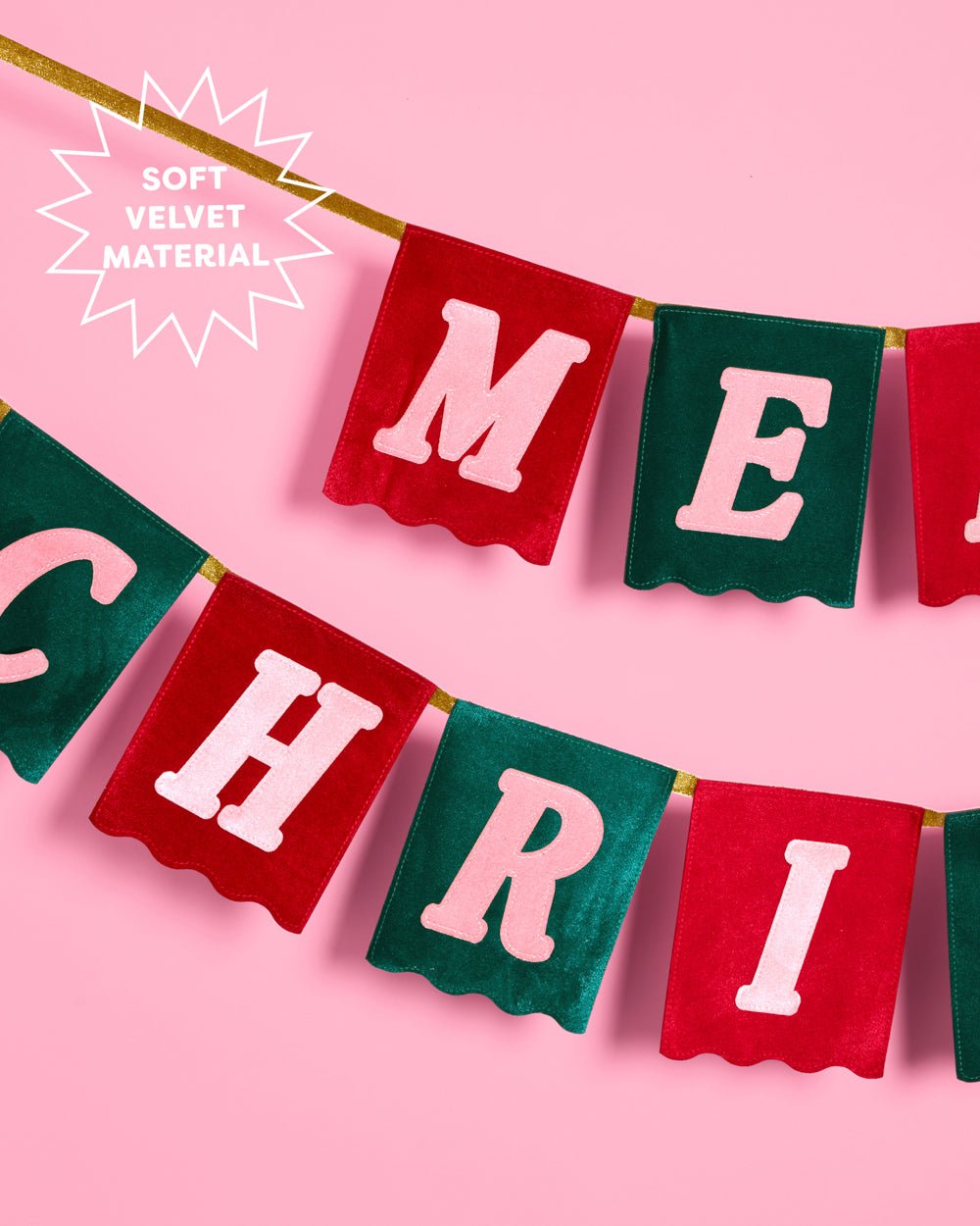 Close view of the soft velvet flags and pink lettering on the Merry Christmas banner